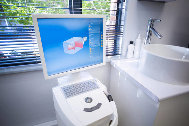 picture of itero intraoral scanner in dental office next to sink